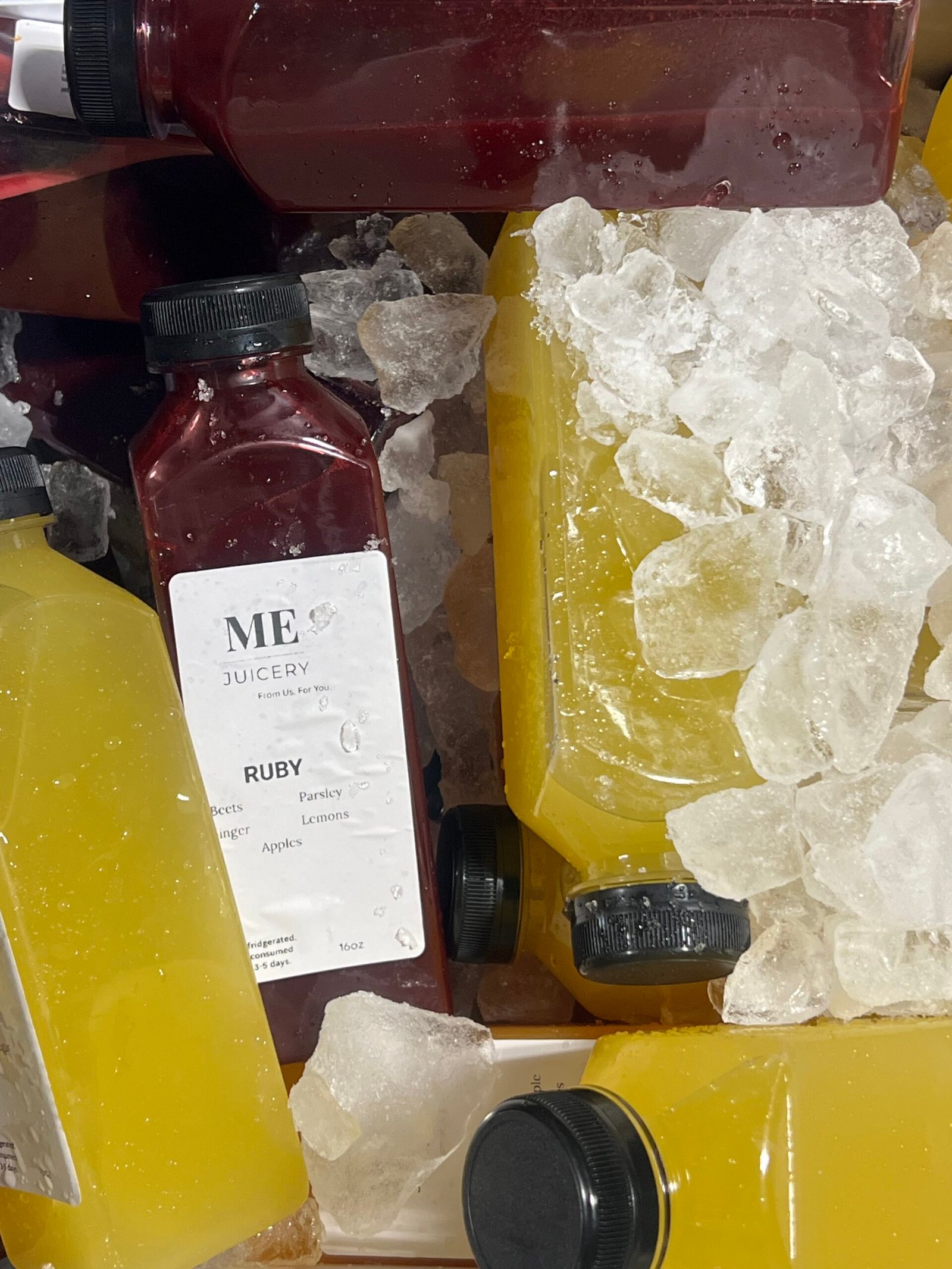 ME Juicery bottles on ice